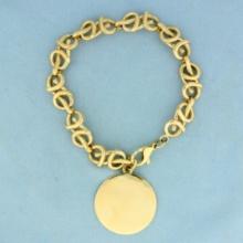 Designer Link Chain Bracelet With Large Circle Charm In 14k Yellow Gold