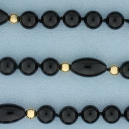 35 Inch Onyx And Gold Bead Hand Knotted Necklace In 14k Yellow Gold