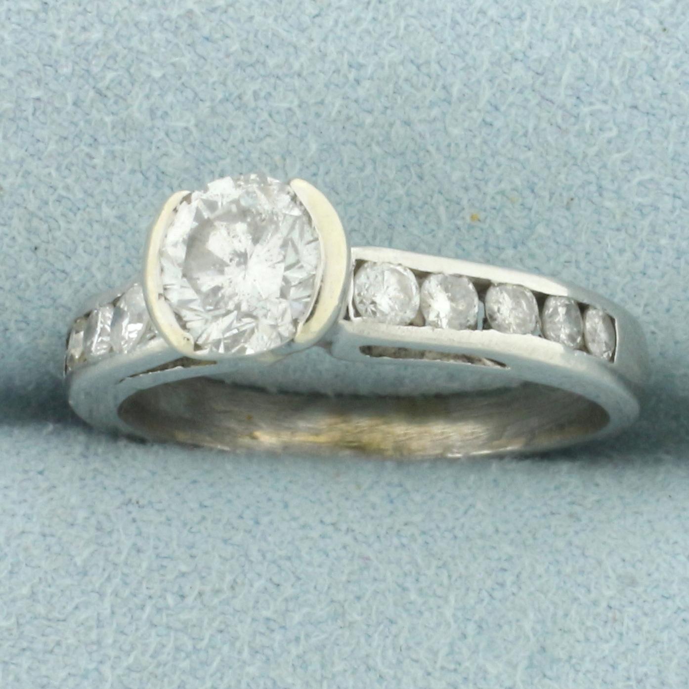 Unique Half Bezel Diamond Engagement Ring In Platinum