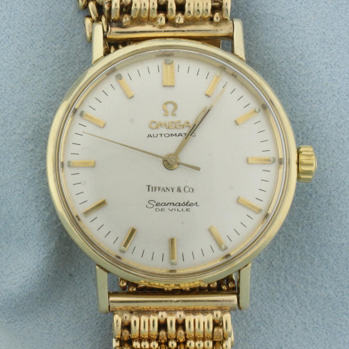 Omega Tiffany And Co. Seamaster Deville Wristwatch In Solid 14k Yellow Gold