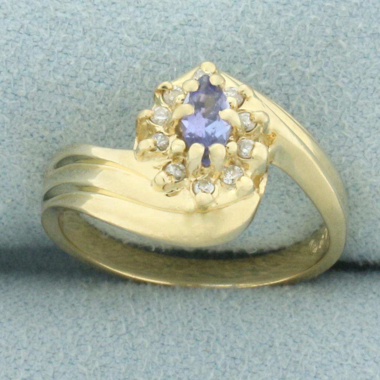 Tanzanite And Diamond Flower Bypass Ring In 14k Yellow Gold