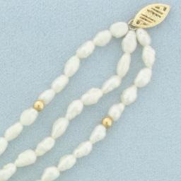 Triple Strand Baroque Pearl And Gold Bead Bracelet In 14k Yellow Gold