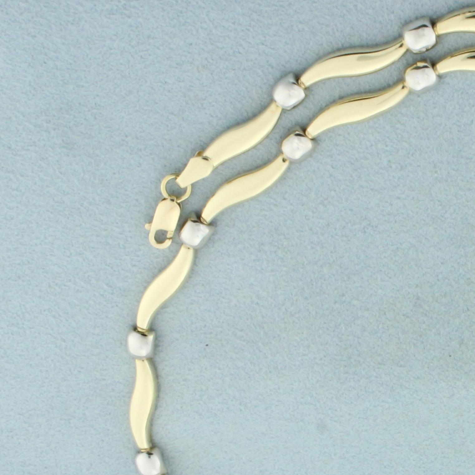 17 Inch Two Tone Alternating Swirl And Box Design Necklace In 14k Yellow And White Gold