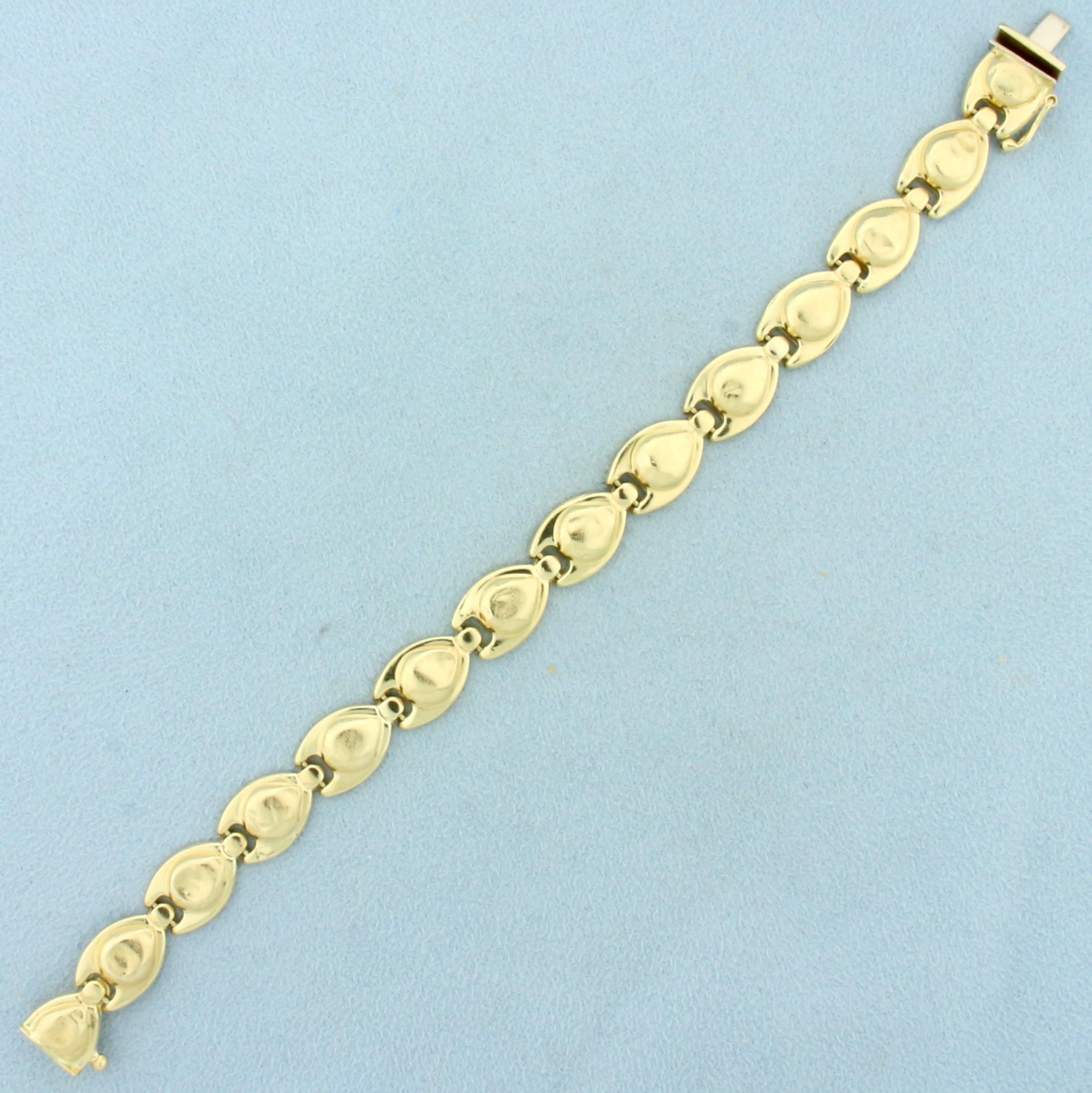 Abstract Designer Link Bracelet In 14k Yellow Gold