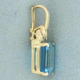 Swiss Blue Topaz And Diamond Pendant In 14k Yellow Gold