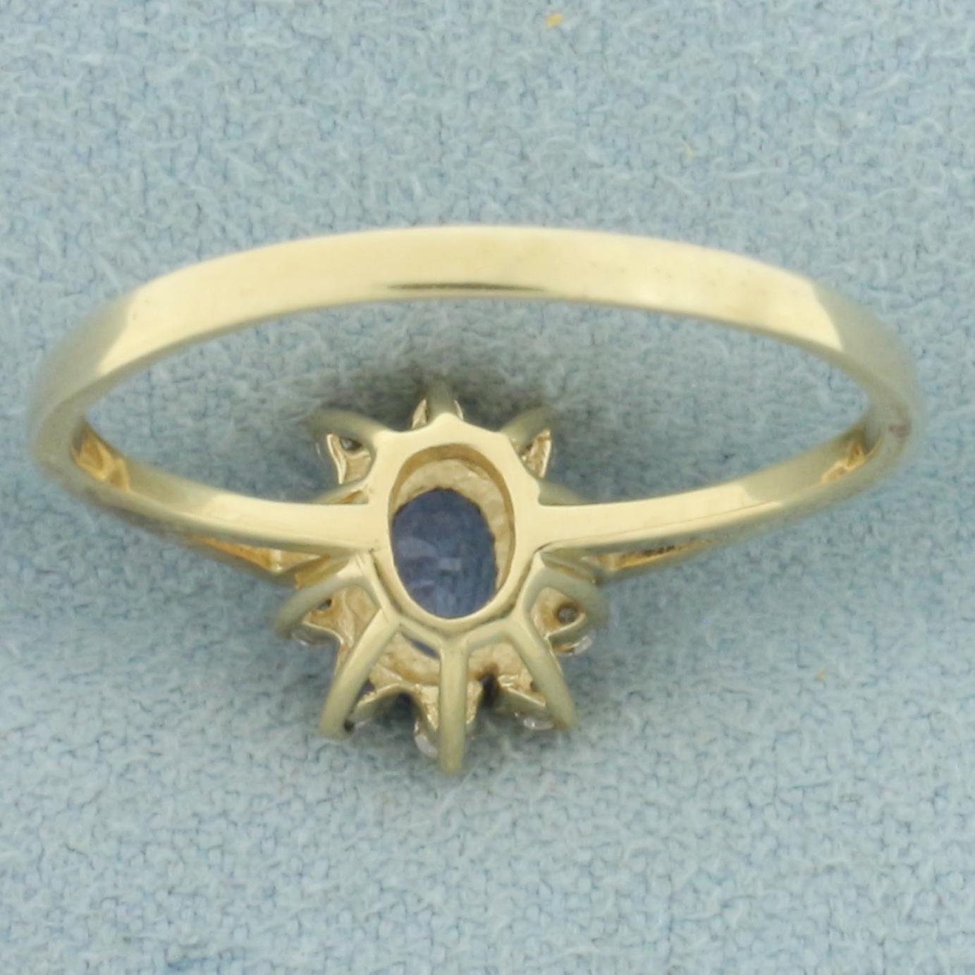 Tanzanite And Diamond Halo Ring In 14k Yellow Gold