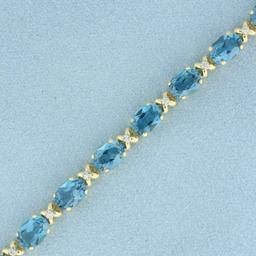 Swiss Blue Topaz And Diamond Tennis Bracelet In 14k Yellow Gold