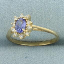 Tanzanite And Diamond Halo Ring In 14k Yellow Gold