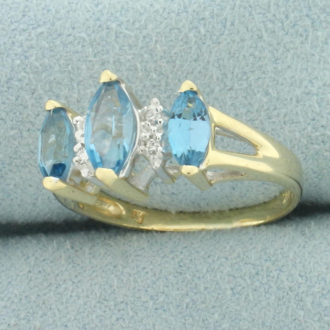 Marquise Blue Topaz And Diamond Ring In 14k Yellow Gold