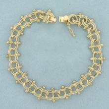 Double Loop And Bead Charm Bracelet In 14k Yellow Gold