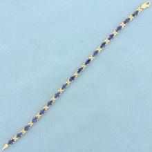 8.5ct Tw Tanzanite Flower Design Line Bracelet In 14k Yellow Gold