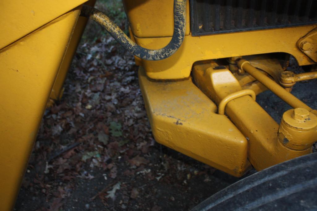 JD 300 3 cylinder Diesel loader backhoe in nice condition;