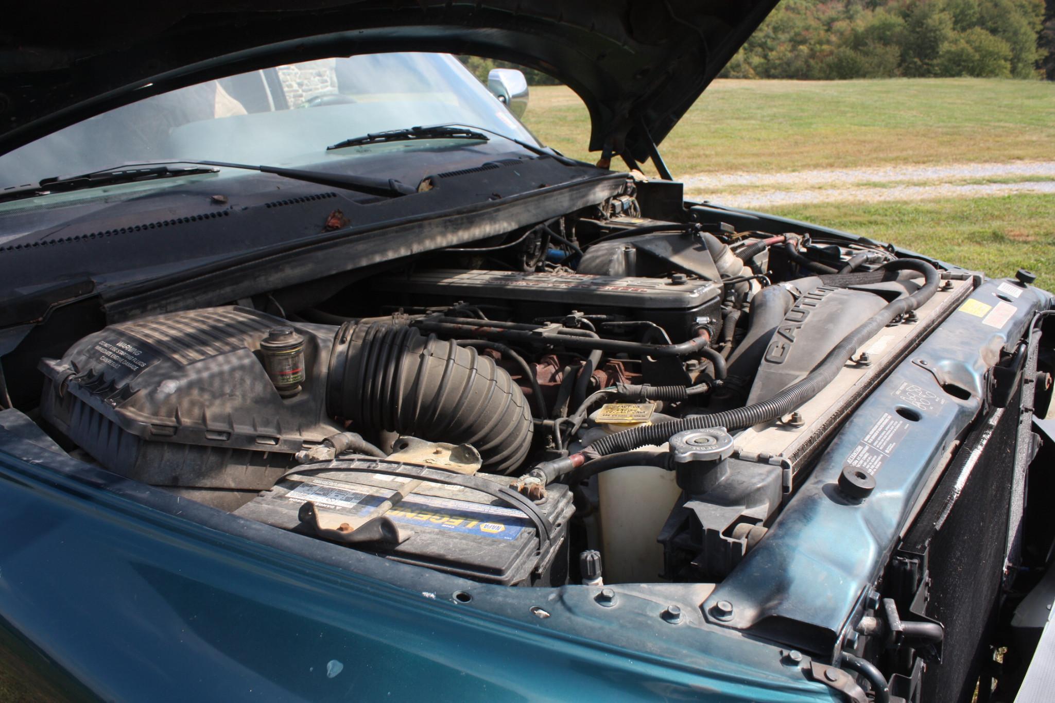 1999 Dodge extended cab, 250 Diesel 4X4 auto, rusty but runs and drives.