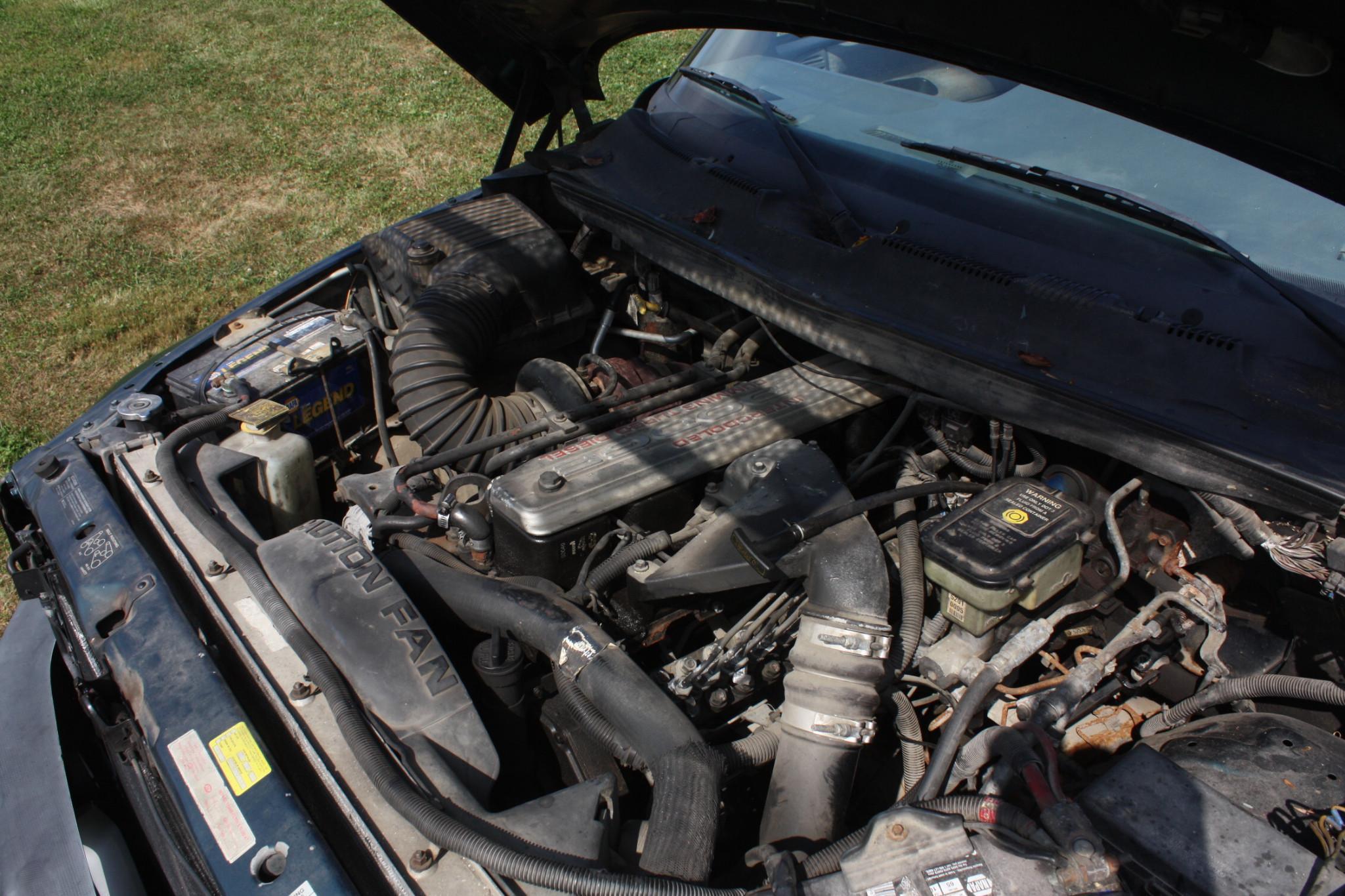 1999 Dodge extended cab, 250 Diesel 4X4 auto, rusty but runs and drives.