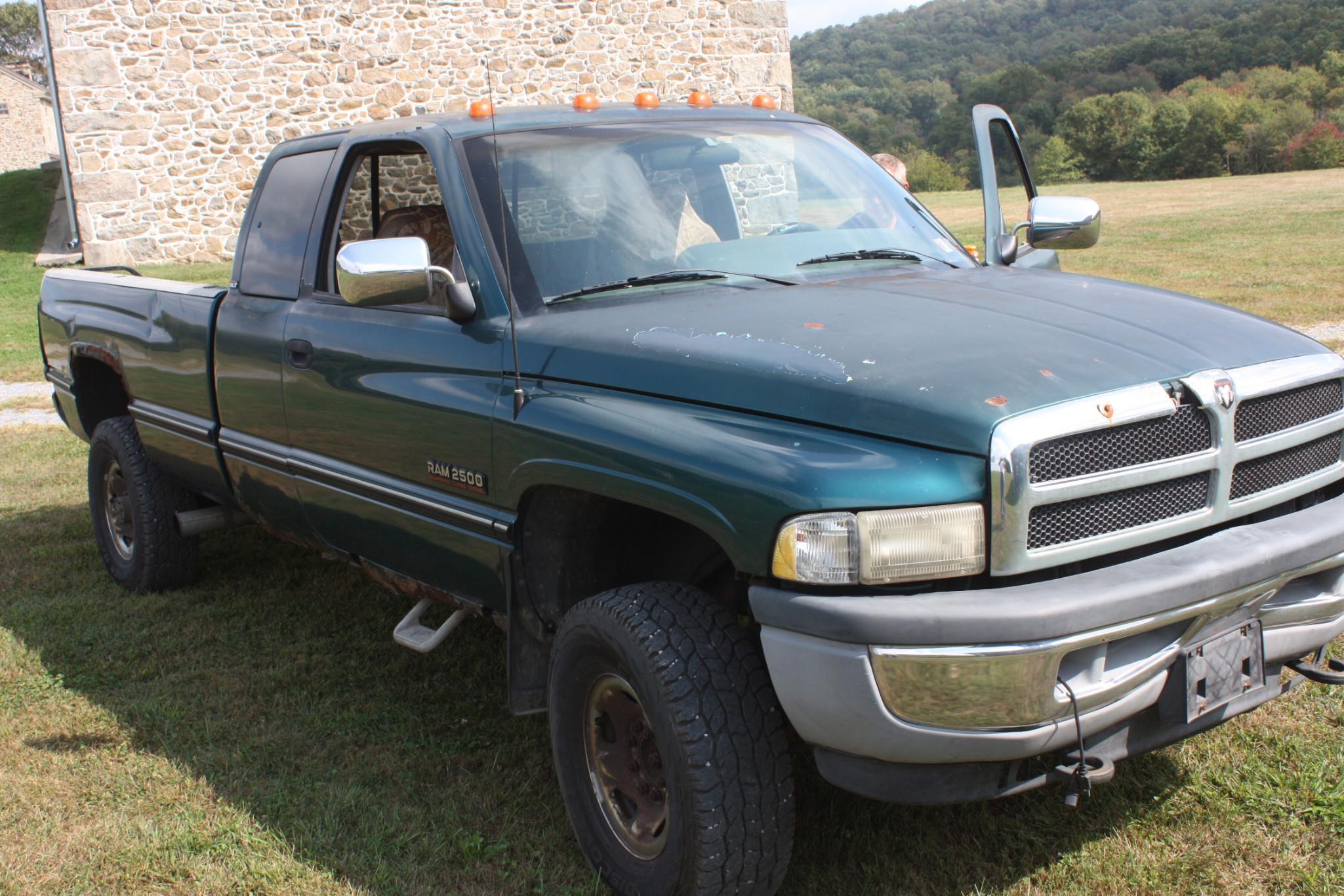 1999 Dodge extended cab, 250 Diesel 4X4 auto, rusty but runs and drives.