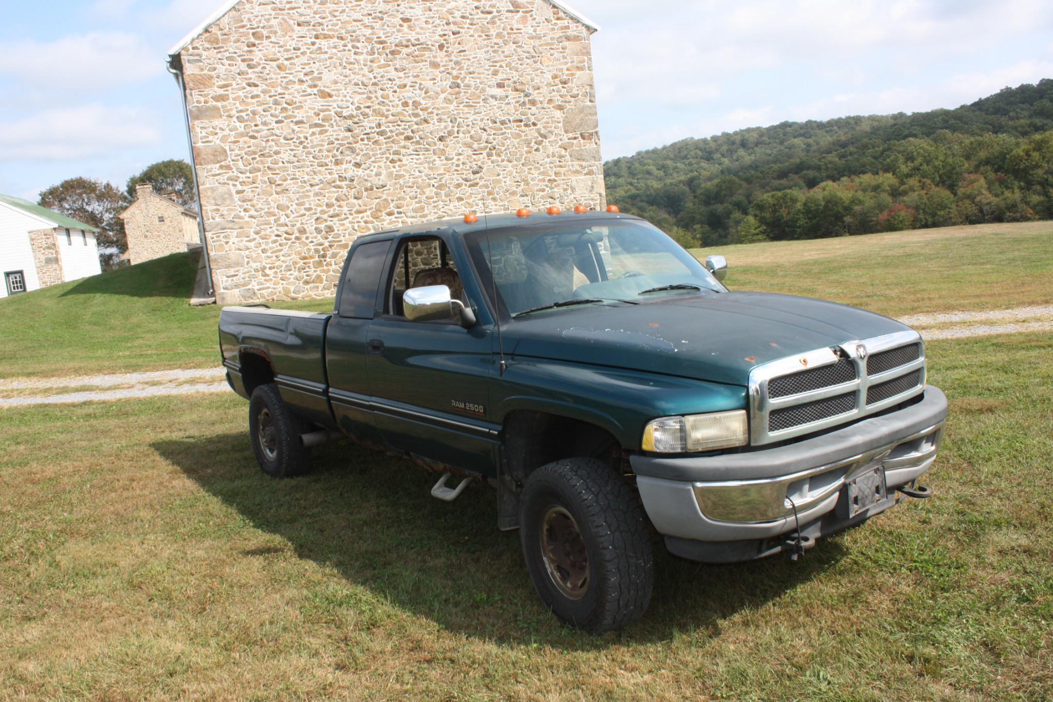 1999 Dodge extended cab, 250 Diesel 4X4 auto, rusty but runs and drives.