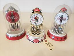 3 small Coca-Cola mantel clocks
