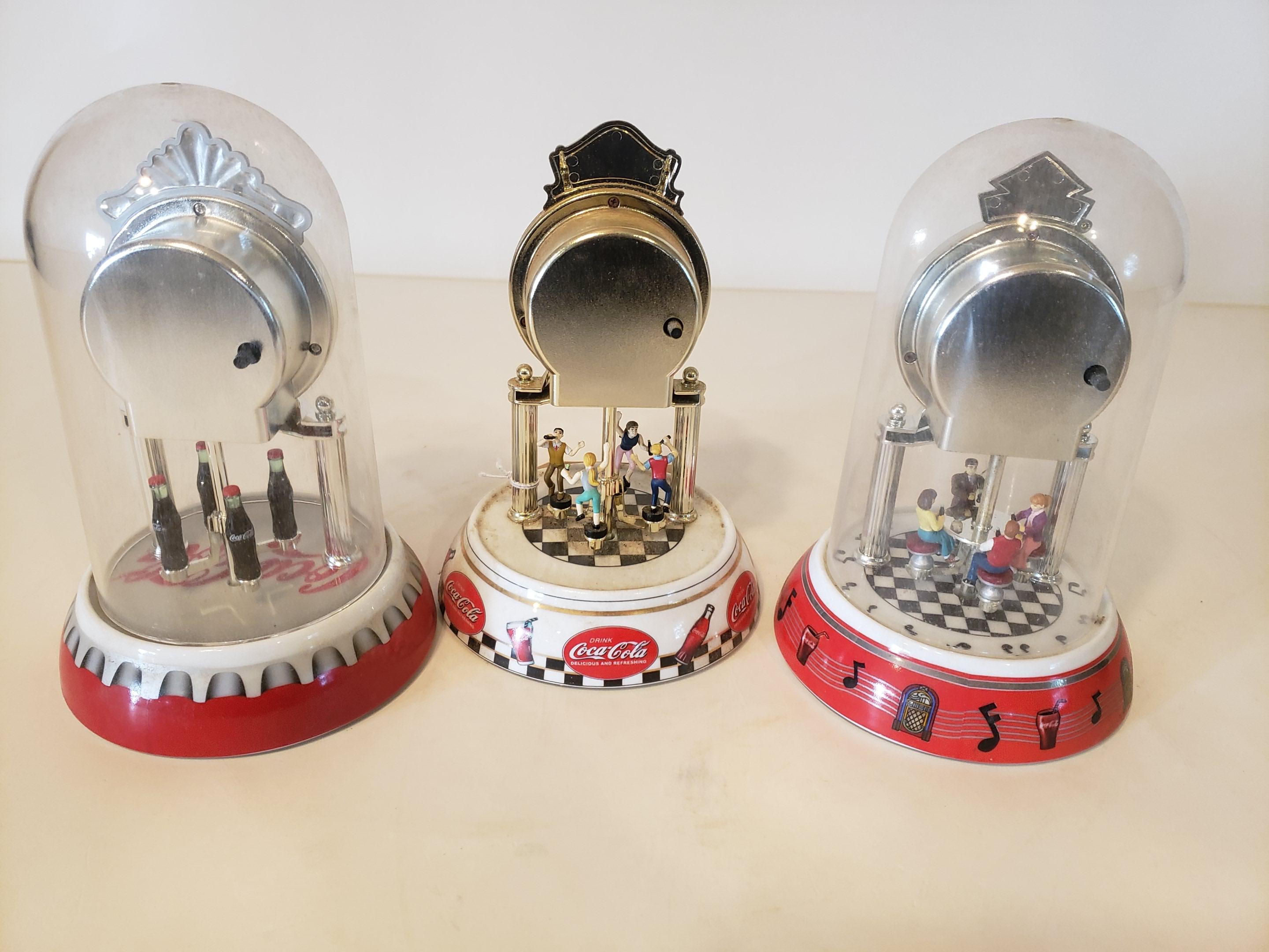 3 small Coca-Cola mantel clocks