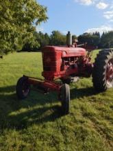 Farmall M tractor set up for pulling