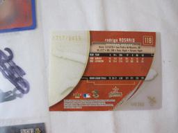 8 Premium Baseball Cards from various brands including Derek Lowe 424/650, Rodrigo Rosario
