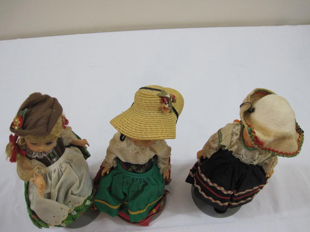 Three Vintage Madame Alexander 8" International Dolls on Stands including Italy, Austria, and