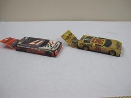 Two Sets of Traks Collectible Race Cards including Darrell Waltrip Team Set and Michael Waltrip Team