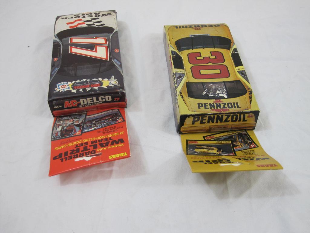 Two Sets of Traks Collectible Race Cards including Darrell Waltrip Team Set and Michael Waltrip Team