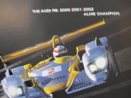 Audi R8's Racing Poster, ALMS Champion 2000, 2001, 2002, 23" x 34", contains minor damage to bottom