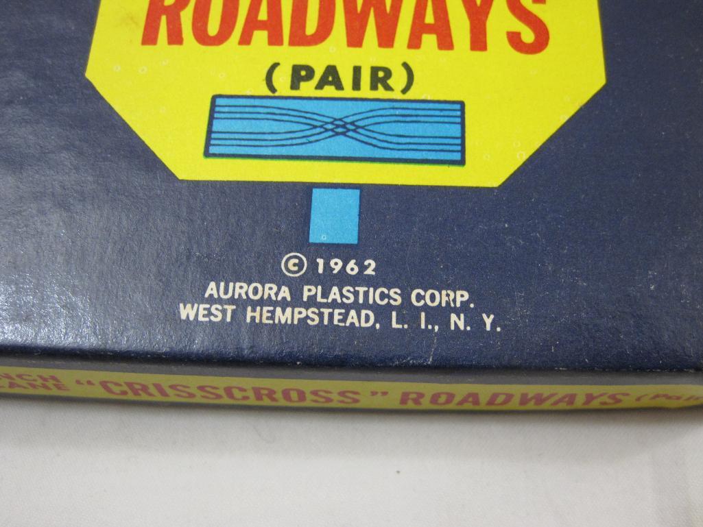 Aurora HO Scale Slot Track No. 1524 9 inch 2 lane "Crisscross Roadways" (Pair), in original box,