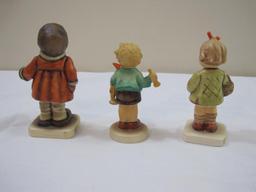 TWO Vintage Hummel Goebel Ceramic Figures including Winter Song #293, Boy with Rocking Horse #239,