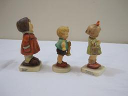 TWO Vintage Hummel Goebel Ceramic Figures including Winter Song #293, Boy with Rocking Horse #239,