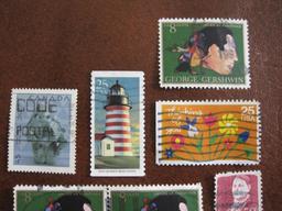 Lot of approximately thirteen cancelled US stamps including one block of six 8 cent George gershwin