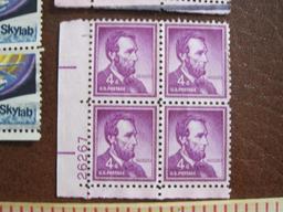 Three blocks of canceled US stamps