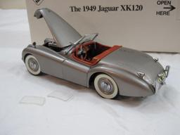 The 1949 Jaguar XK120 Diecast Model Car, The Danbury Mint, in original box, damage to windshield, AS