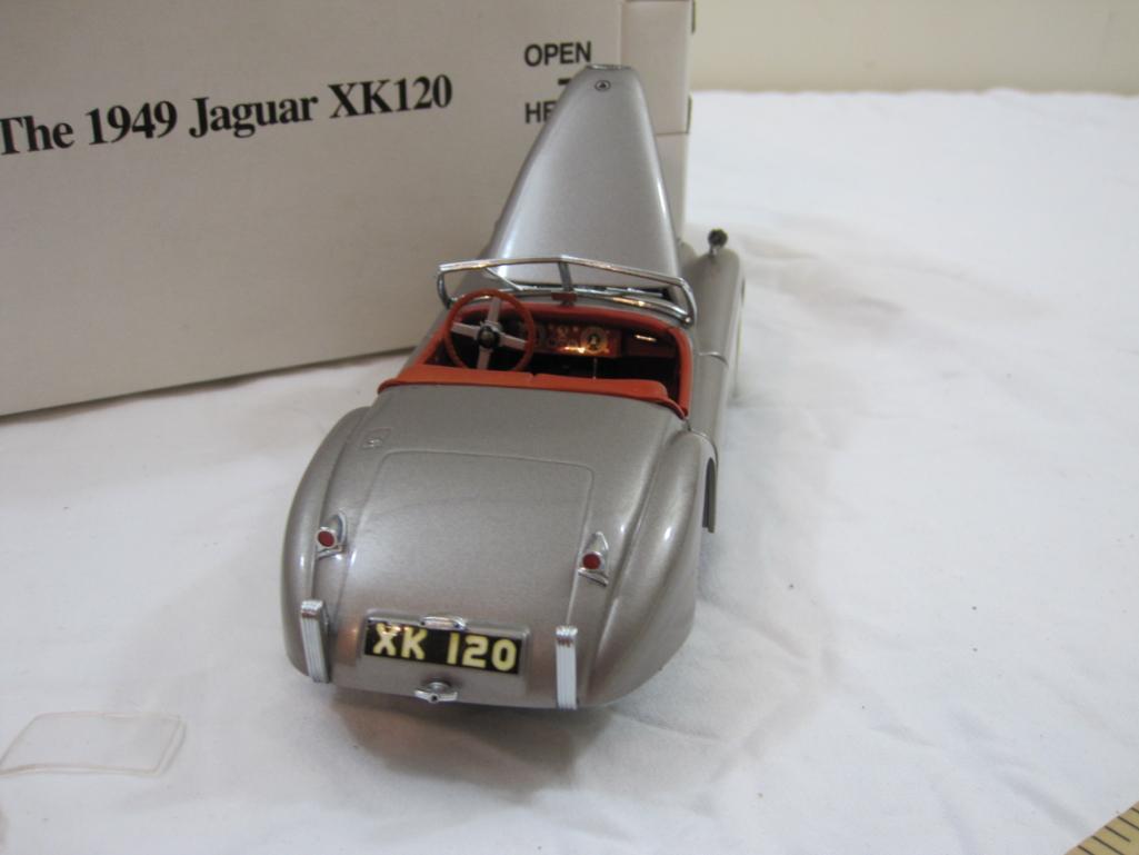 The 1949 Jaguar XK120 Diecast Model Car, The Danbury Mint, in original box, damage to windshield, AS