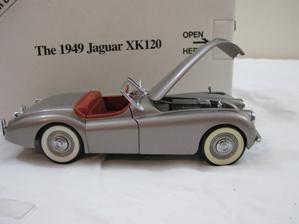 The 1949 Jaguar XK120 Diecast Model Car, The Danbury Mint, in original box, damage to windshield, AS