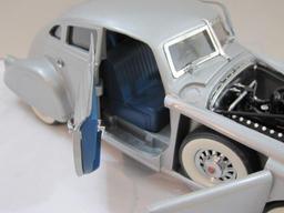 The 1933 Pierce Silver Arrow Diecast Model Car, The Danbury Mint, in original box, 2 lbs 3 oz