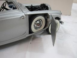 The 1933 Pierce Silver Arrow Diecast Model Car, The Danbury Mint, in original box, 2 lbs 3 oz