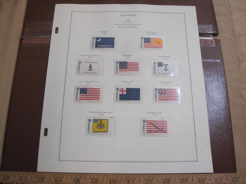 Completed official Scott album page including 1968 Historic Flag Series; all stamps mounted and