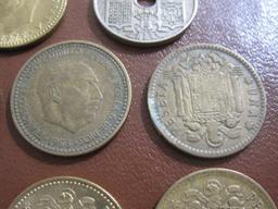 Lot of Spain coins, including 1949 50 Centimos, 7 Francisco Franco una peseta coins (mostly, 1960s),