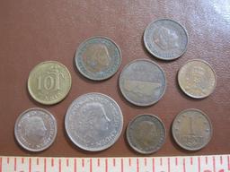 One Finnish 10 pennia coin plus 8 Netherlands coins