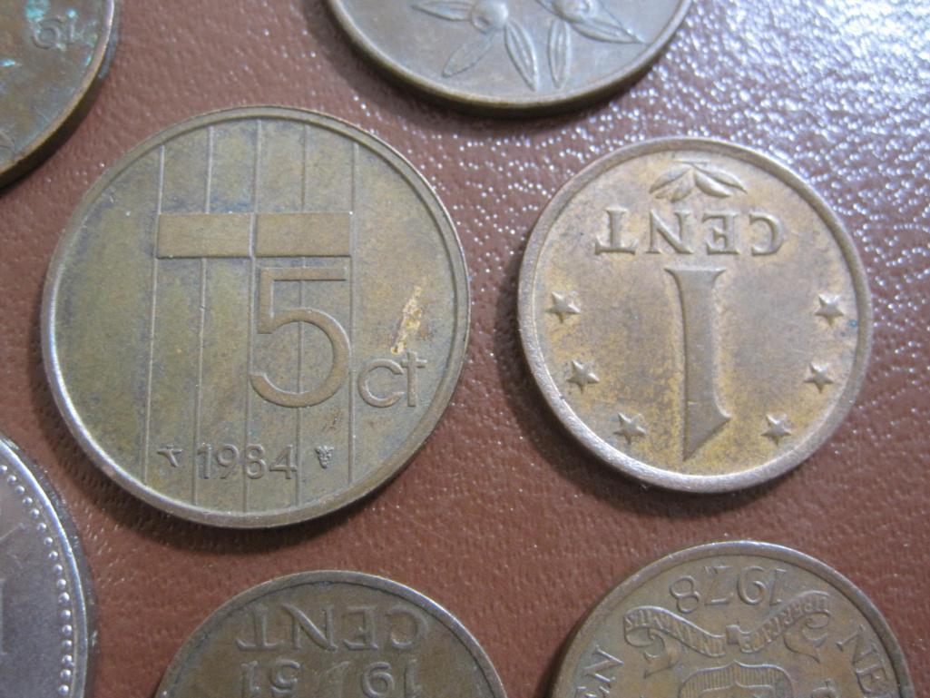 One Finnish 10 pennia coin plus 8 Netherlands coins