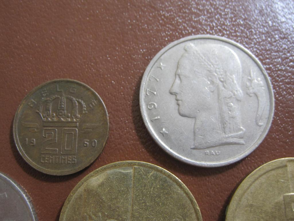 Lot of five Belgian coins: one 1960 20 centimes, two 5 francs (1974 & 77) and two 1986