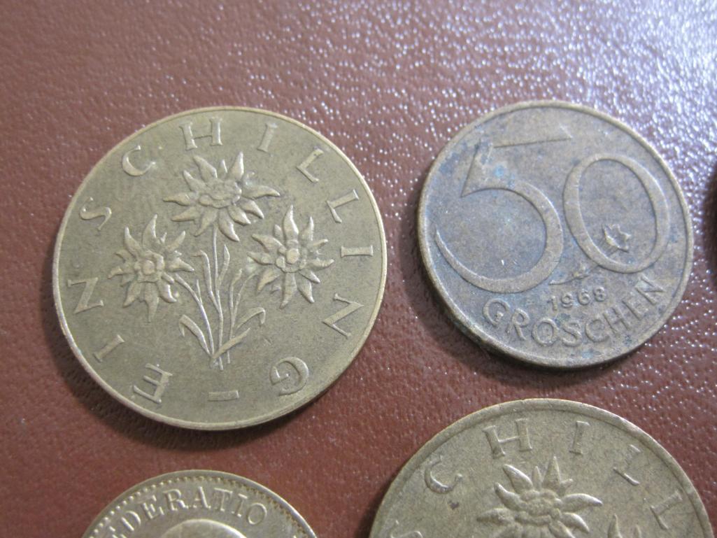 Lot of 6 assorted foreign coins; one Swiss 1982 5 rappen, one Portuguese 1973 50 centavos, one