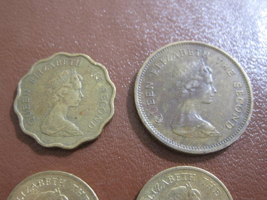 Lot of FOUR Hong Kong coins: two 10 cents (1982 & 83), one Twenty cents (1979) and one Fifty cents