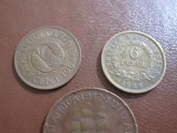 one 1938 British West Africa 6 pence, one 1964 Sierra Leone 1/2 cent and one bronze 1942 South