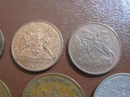 Lot of 8 coins from Trinidad and Tobago: 1 25 cent piece (1980), 3 5 cent pieces (1966 and 1983) and