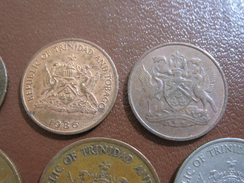 Lot of 8 coins from Trinidad and Tobago: 1 25 cent piece (1980), 3 5 cent pieces (1966 and 1983) and