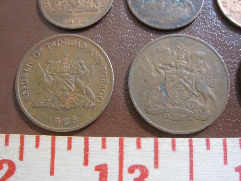 Lot of 8 coins from Trinidad and Tobago: 1 25 cent piece (1980), 3 5 cent pieces (1966 and 1983) and