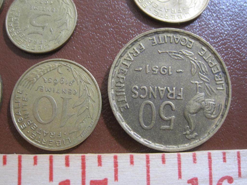 Lot of 9 French coins: 1 1951 50 francs; 1 1965 20 centimes; 4 10 centimes (1963, 74,79 and 83) and